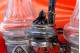 Galhetas de altar em vidro lapidado com estrutura em  prata com enrolamentos
